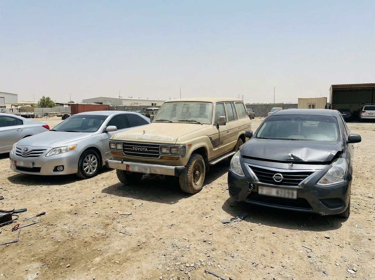 A mix of cars waiting to be assessed, from clean saloons to accident-damaged vehicles